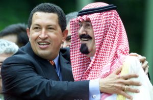 CARACAS, VENEZUELA: Venezuelan President Hugo Chavez (L) hugs Saudi Arabian Crown Prince Abdullah Ibn Abdul Aziz Al-Saud during the official photo session at the end of the OPEC II Summit of oil producing countries in Caracaas 28 September, 2000. AFP PHOTO OMAR TORRES (Photo credit should read OMAR TORRES/AFP/Getty Images)