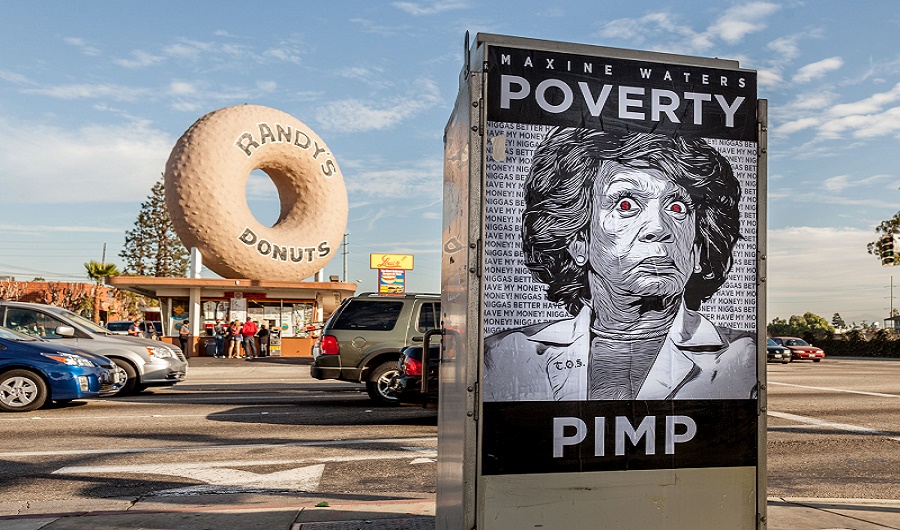 Waters-Poverty-Pimp-Posters-in-front-of-famous-Randys-Donuts-in-Los-Angeles.jpg